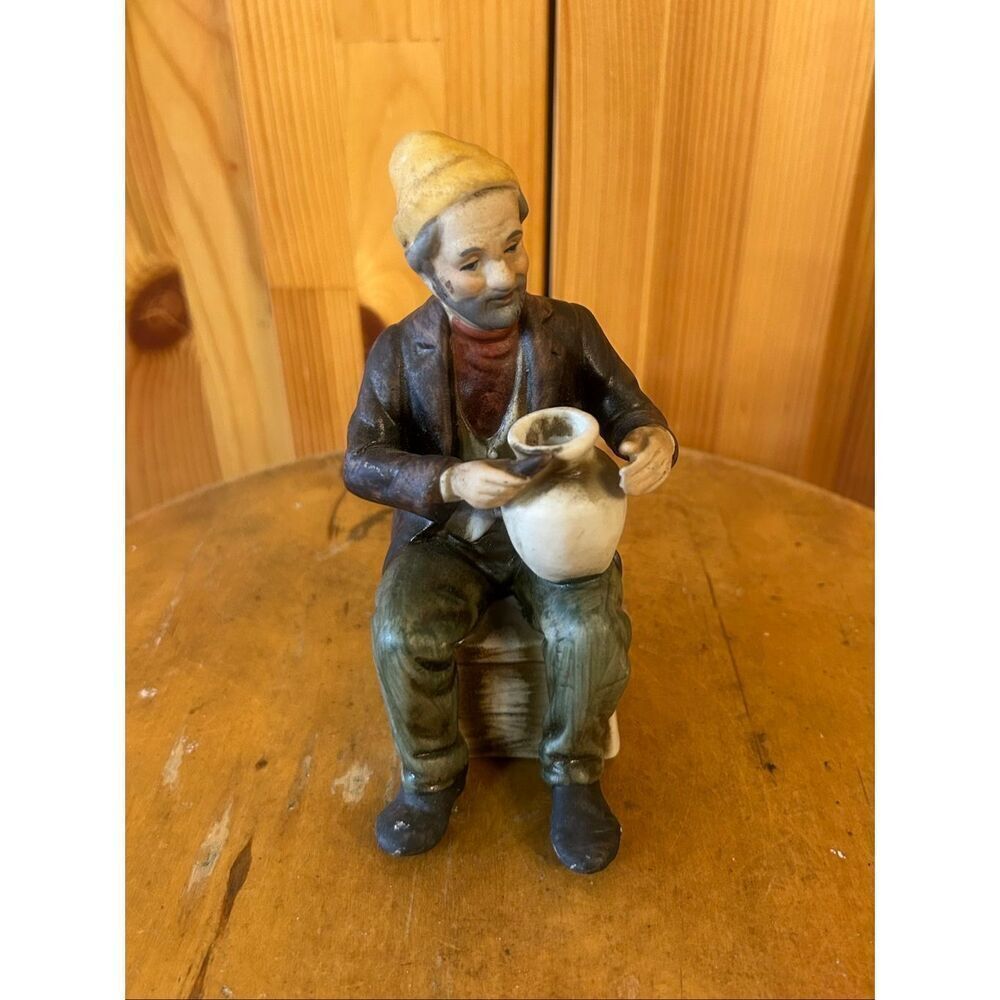 Bisque Porcelain Figurine Of Man Making Vase Vintage (5557)